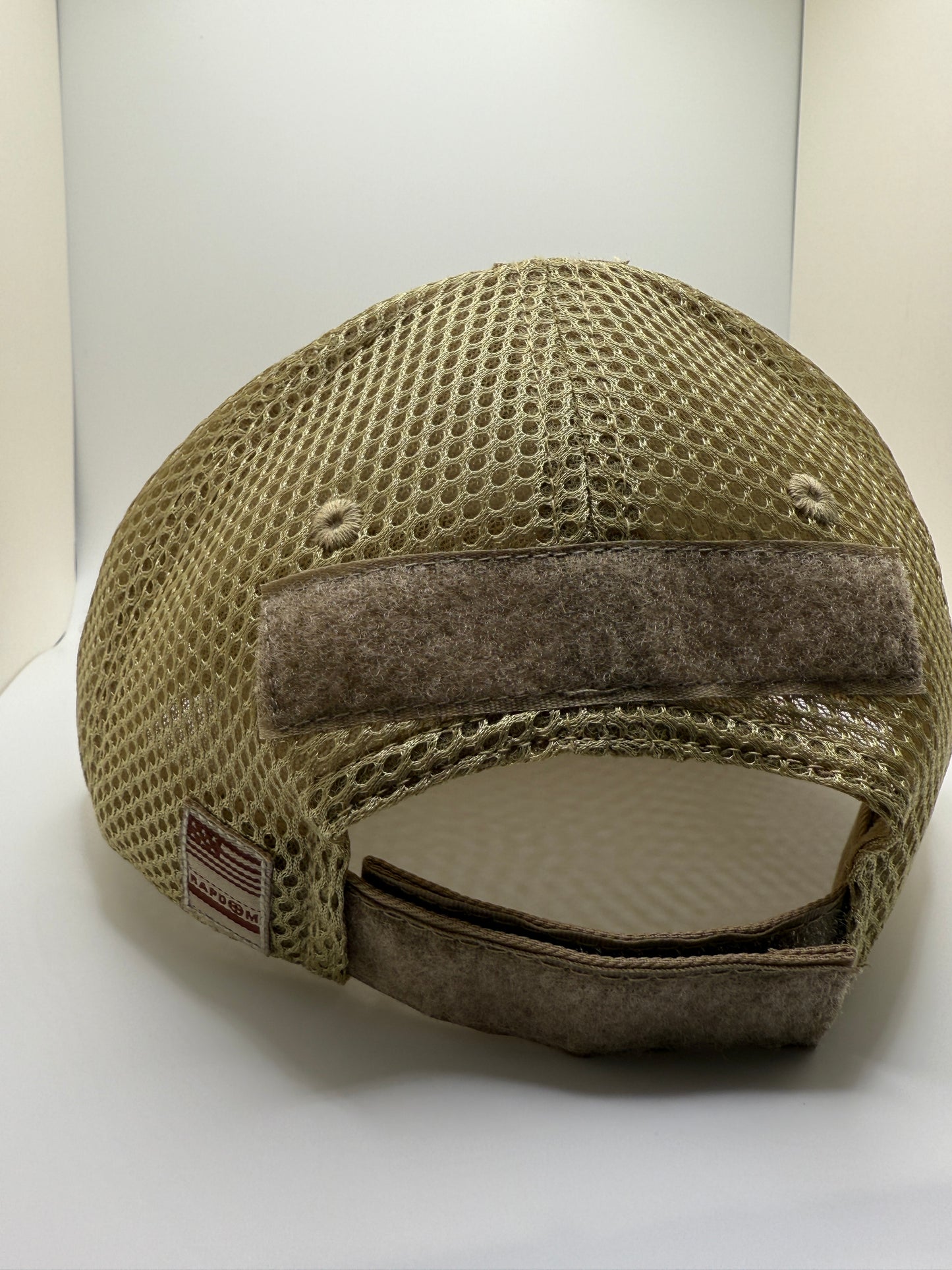 Brown mesh cap on a white background
