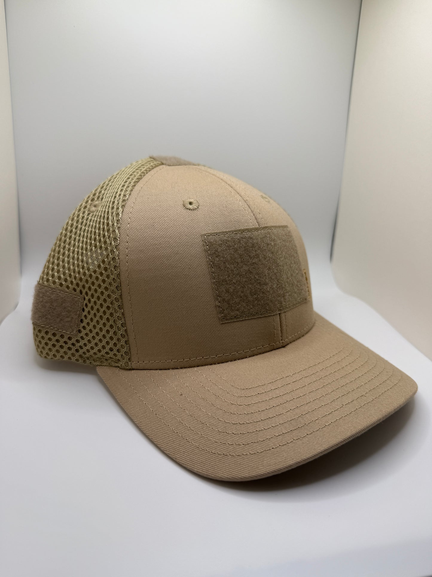 Tan baseball cap with a patch option on a white background